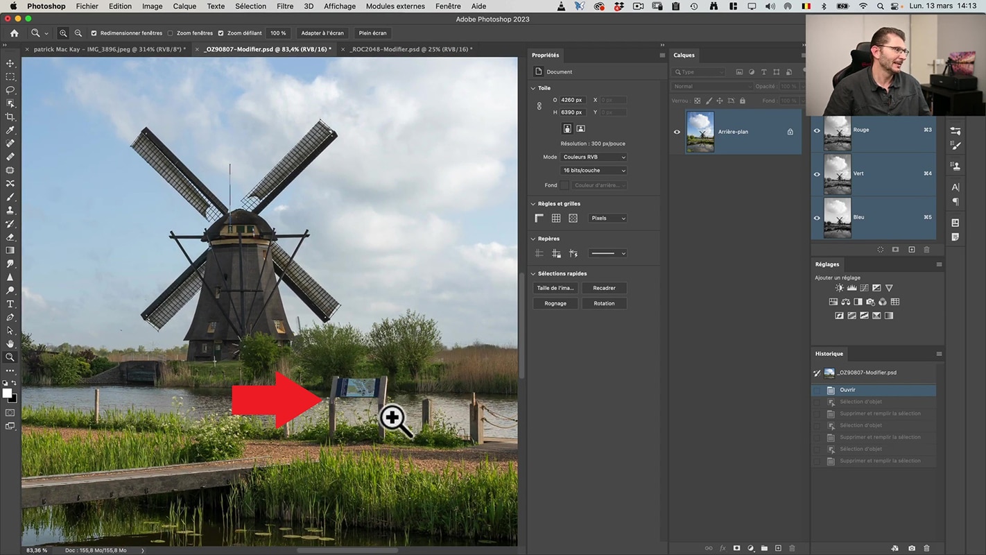 Pancarte indésirable dans le décor de Kinderdijk qu'il faut supprimer et remplir la sélection dans Photoshop.